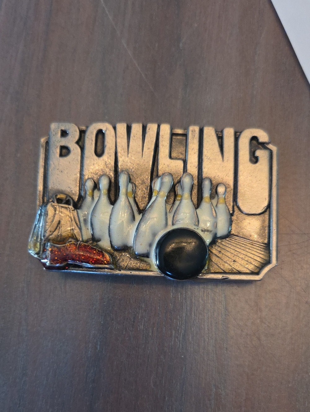 vintage 1985 bowling-themed pewter belt buckle, likely manufactured by the Siski